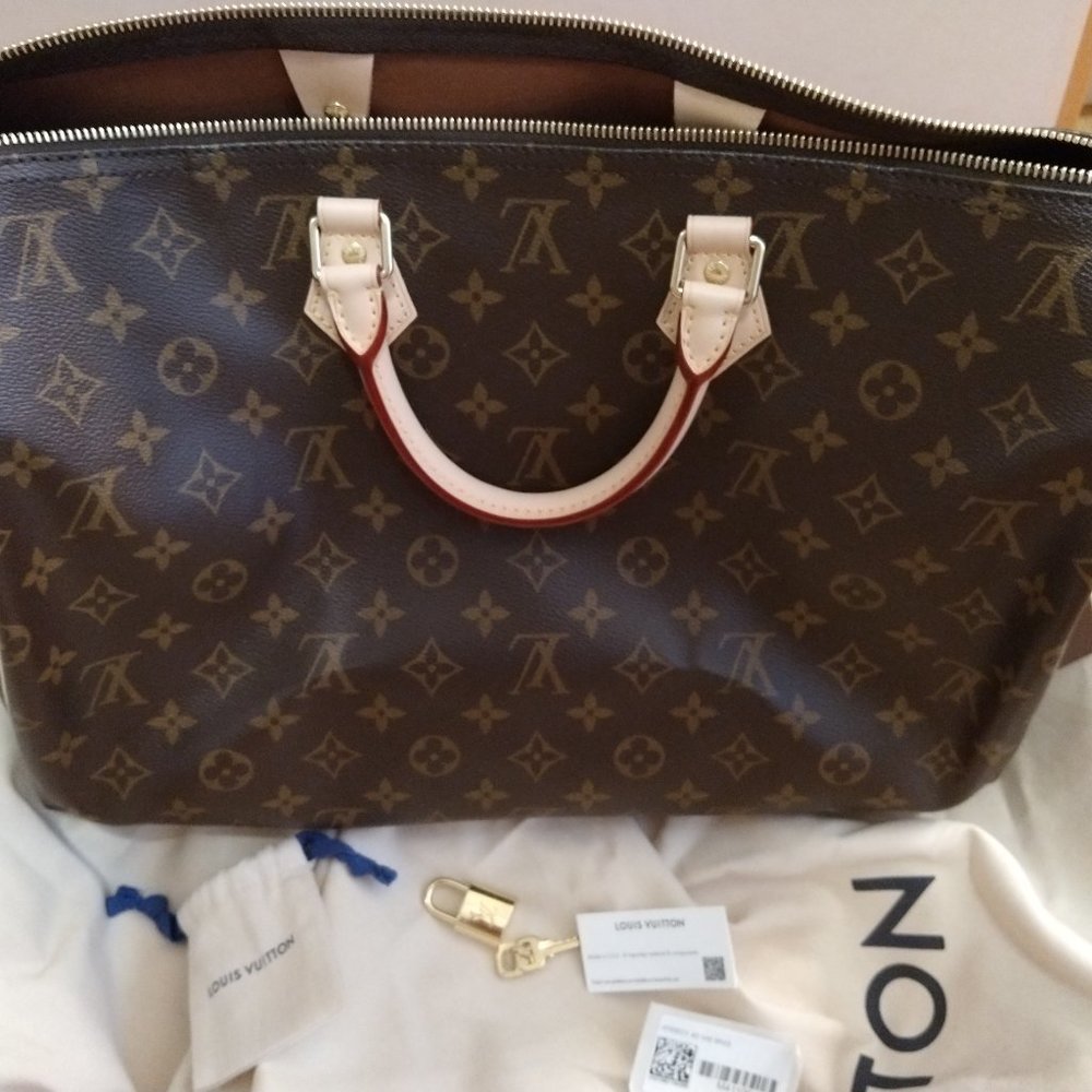 Louis Vuitton M41106 Speedy 40 in monogram -- brand new
